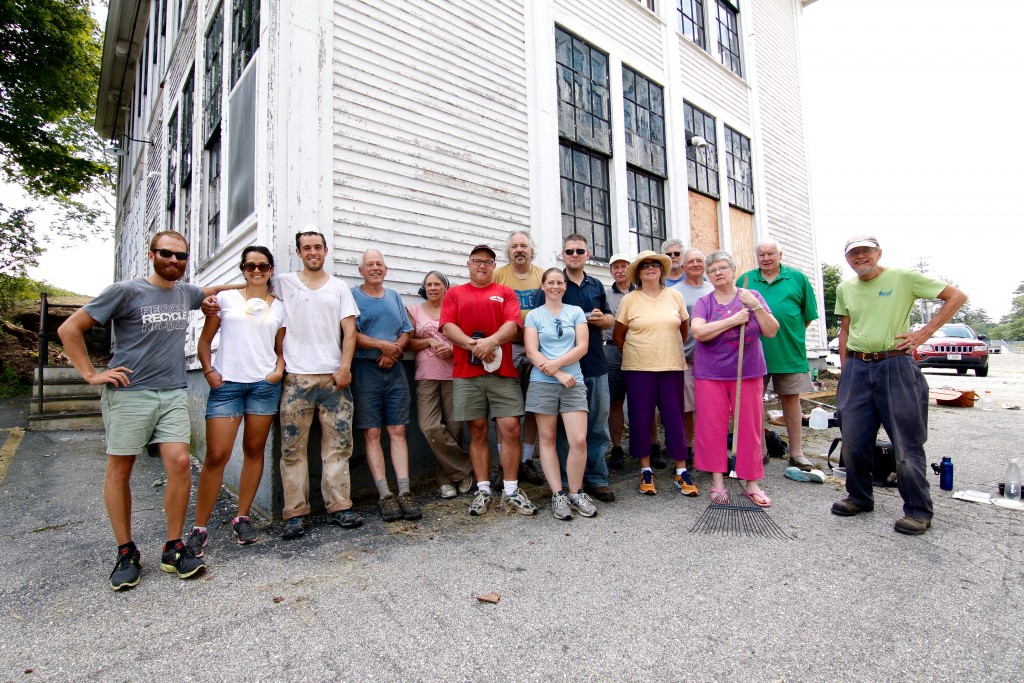 The author, left, with the clean-up crew at the Mill. "With fewer outlets for creative endeavors, projects here can make a proportionally more significant impact, and also seem more inclusive in who they attract." Photo by Ben Wilson.