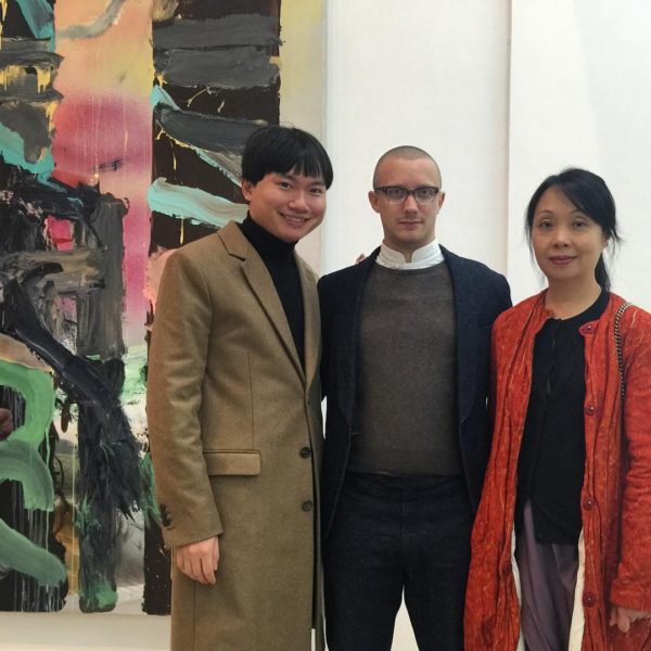 Robin Peckham (center) at the opening of the exhibition “Full of Peril and Wierdness: Painting as a Universalism”, 29 October 2015 – 25 January 2016, at M Woods, Beijing. Image courtesy of Han Zong. 