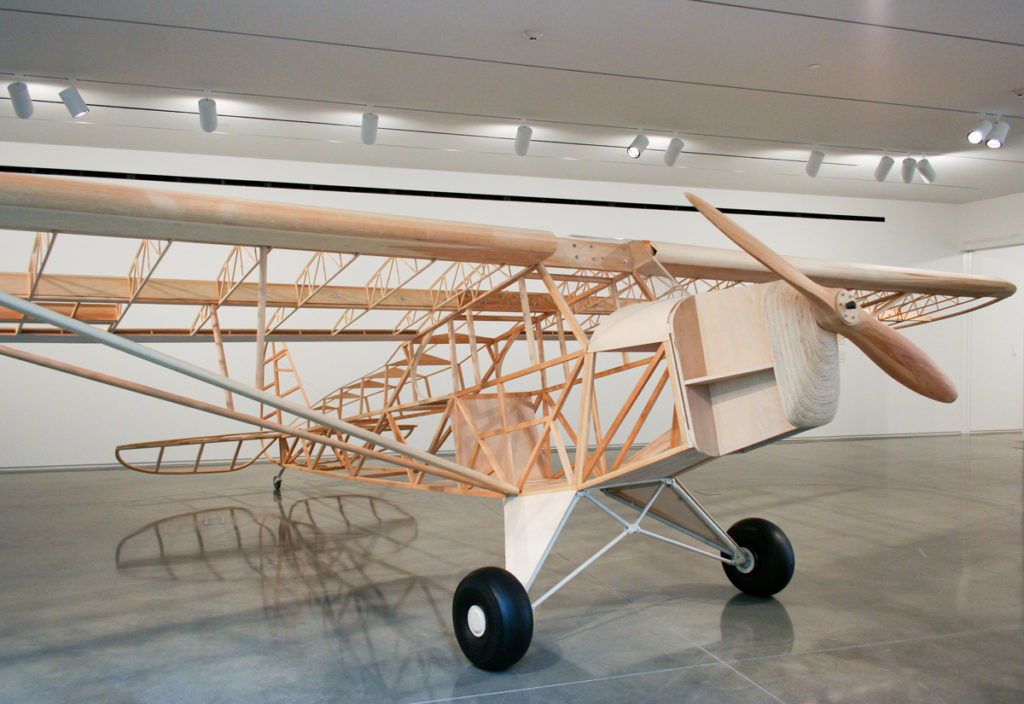 Mark Wethli, Piper Cub, pine, birch plywood and aircraft parts, 35 x 22 x 7 ft., 2007.